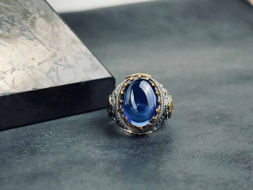 Sterling Silver Ring: Blue Zirconium Stone - Hand Engraved King Theme