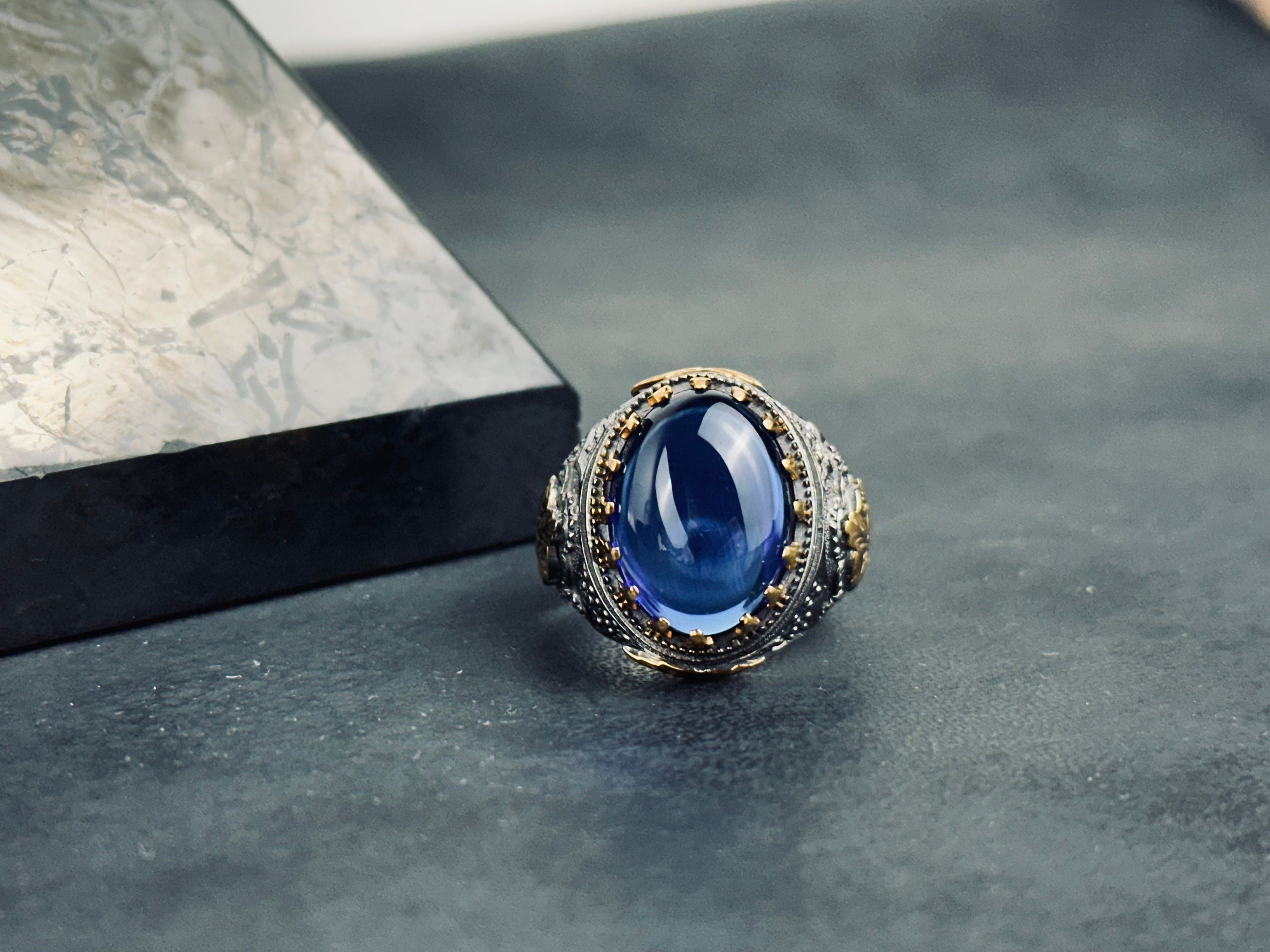 Sterling Silver Ring: Blue Zirconium Stone - Hand Engraved King Theme