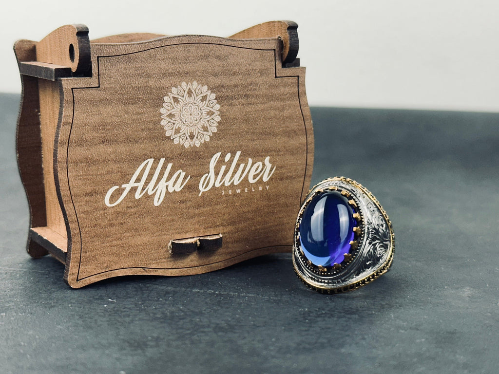 King Theme Sterling Silver Ring: Engraved Blue Zirconium Stone