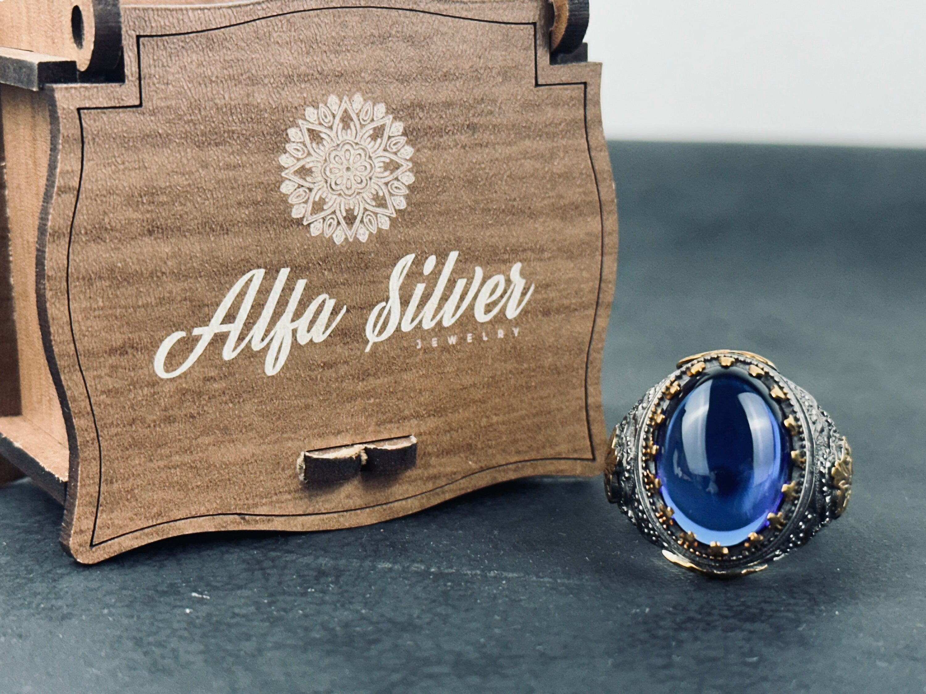 Sterling Silver Ring: Blue Zirconium Stone - Hand Engraved King Theme