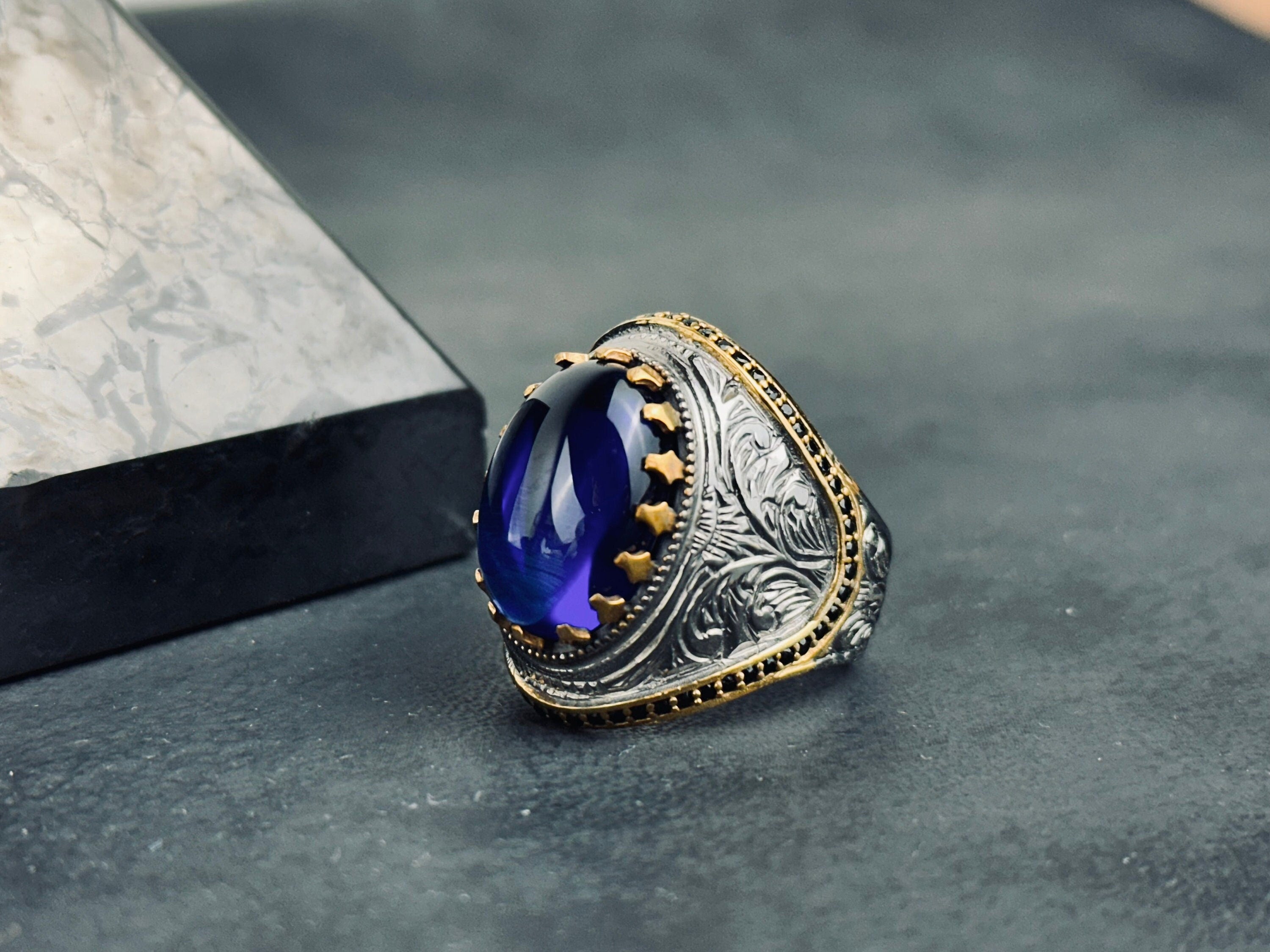 King Theme Sterling Silver Ring: Engraved Blue Zirconium Stone